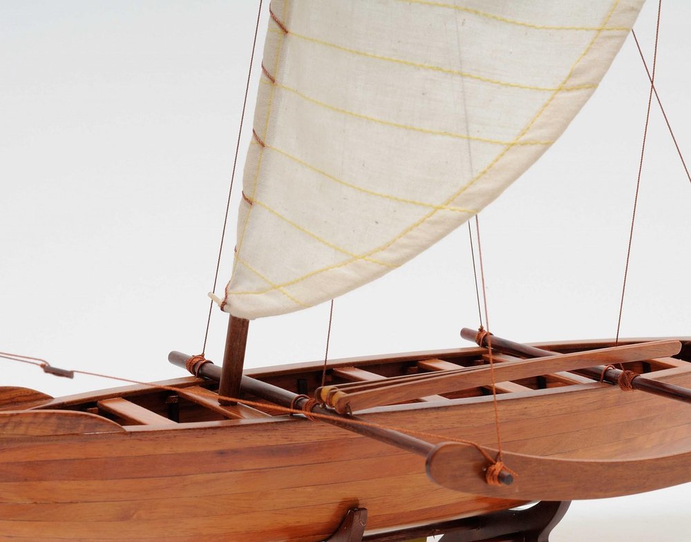10" X 25.25" X 24" Hawaiian Canoe. Home product in cream.