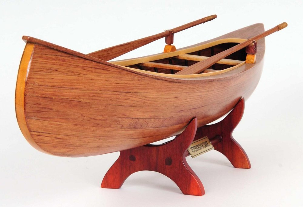 6" Wood Brown Solid Wood Hand Painted Model Boat Tabletop Sculpture. Sculpture isolated on a plain white background, finished in brown wood.