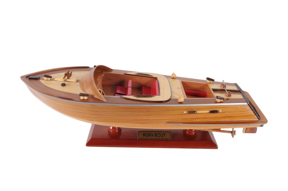 16" Brown Solid Wood Hand Painted Runabout Canoe Model Boat. Home product isolated on a plain white background, finished in brown wood.