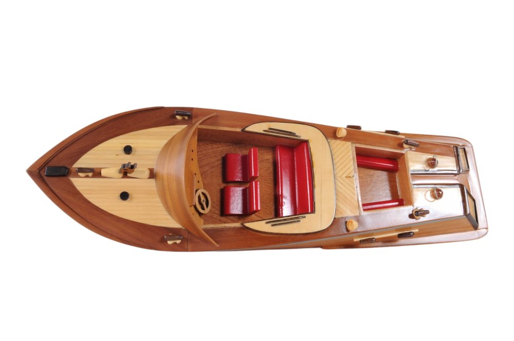 16" Brown Solid Wood Hand Painted Runabout Canoe Model Boat. Home product isolated on a plain white background, in a brown wood finish.