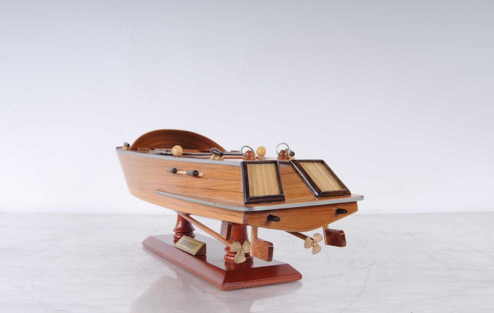 16" Brown Solid Wood Hand Painted Runabout Canoe Model Boat. Home product isolated on a plain white background, showing a brown wood surface.