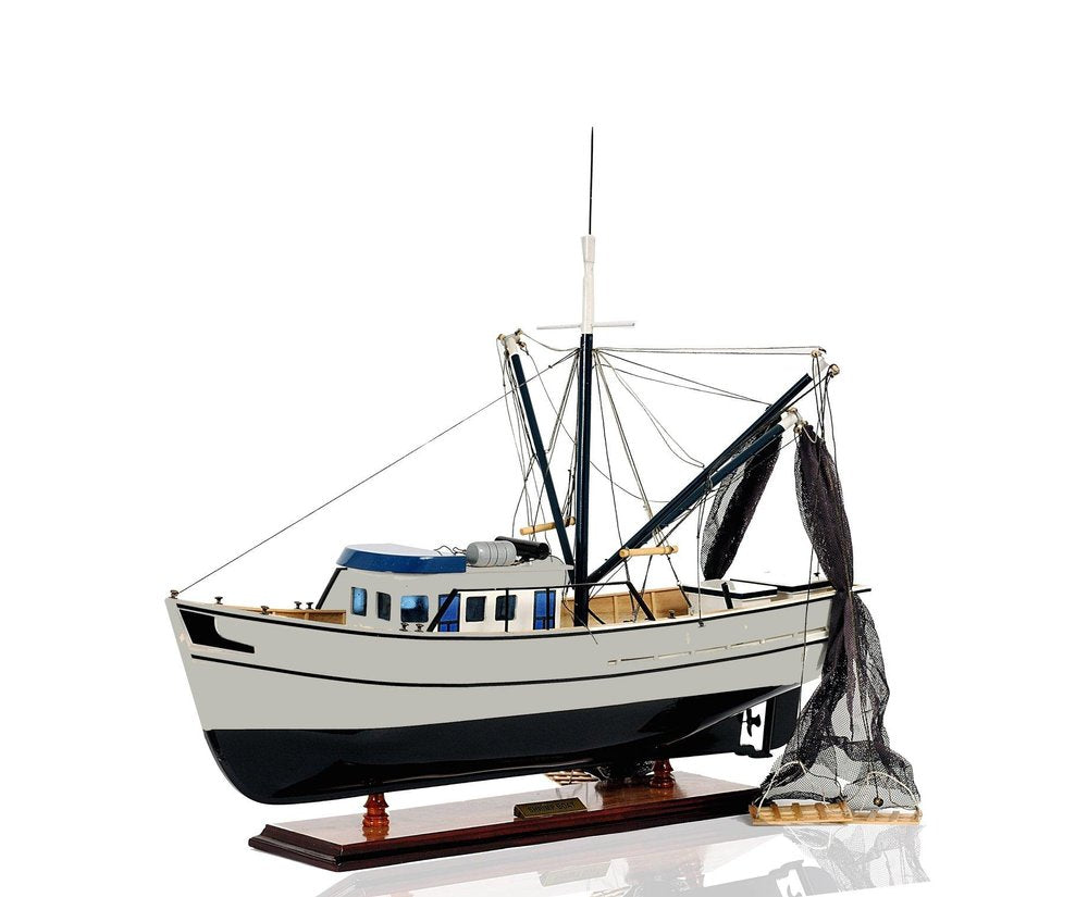 22" Black And White Solid Wood Hand Painted Model Boat. Home product isolated on a plain white background, finished in black wood.