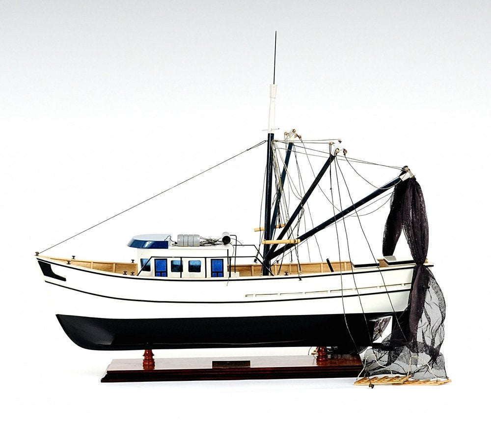 22" Black And White Solid Wood Hand Painted Model Boat. Home product isolated on a plain white background, showing a black wood surface.