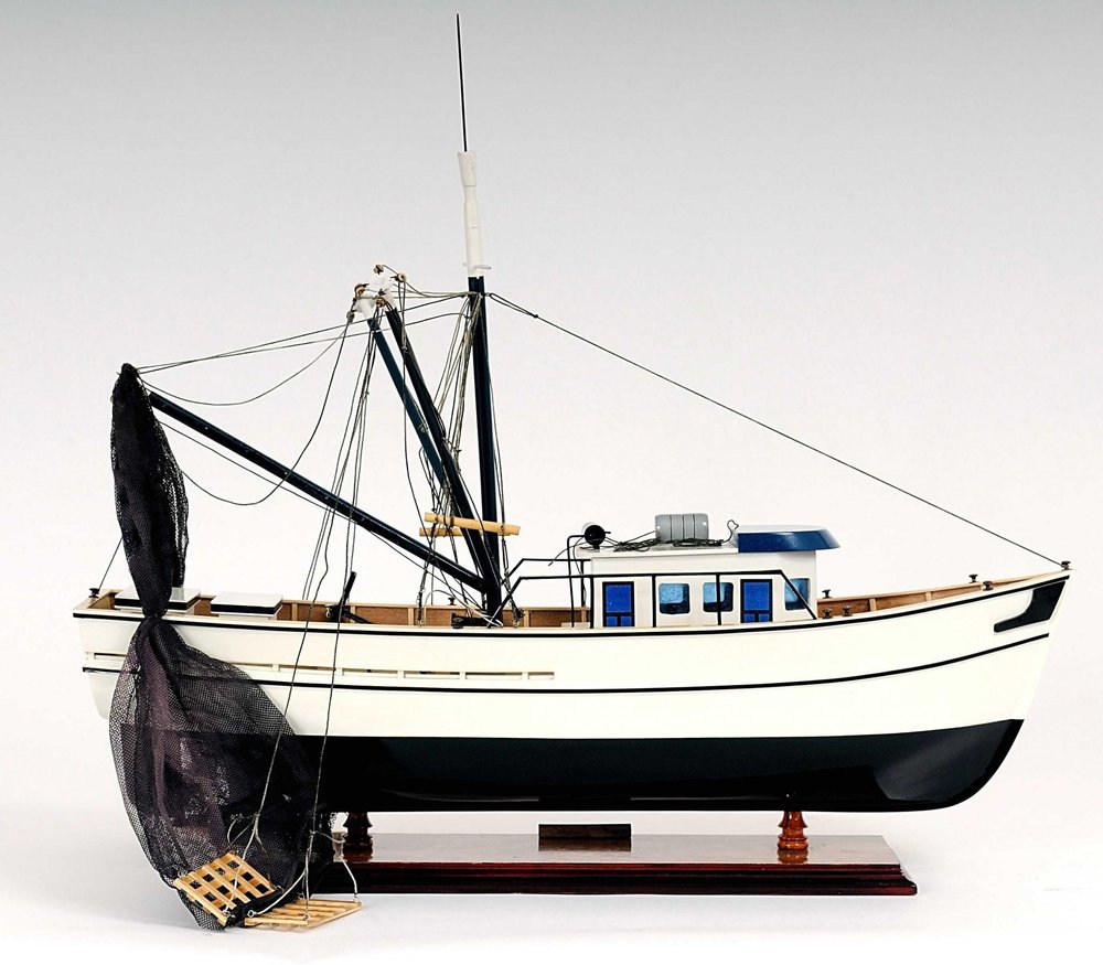 22" Black And White Solid Wood Hand Painted Model Boat. Home product isolated on a plain white background, in a black wood finish.