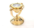 4.5" X 5" X 5.5" Gimbaled Compass. Sculpture isolated on a plain white background, showing a gold metal surface.