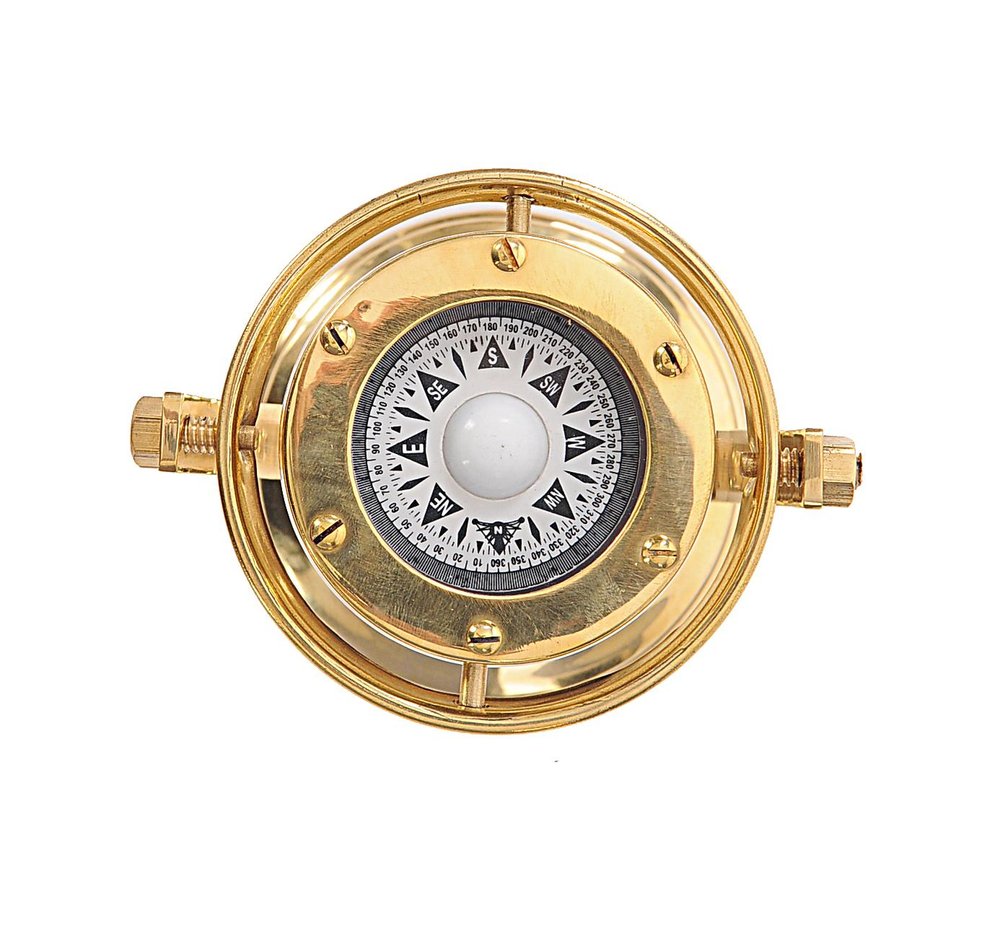 4.5" X 5" X 5.5" Gimbaled Compass. Sculpture isolated on a plain white background, in a gold metal finish.