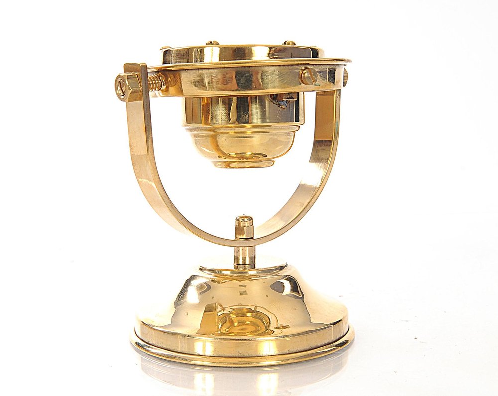 4.5" X 5" X 5.5" Gimbaled Compass. Sculpture isolated on a plain white background, in a gold metal finish.