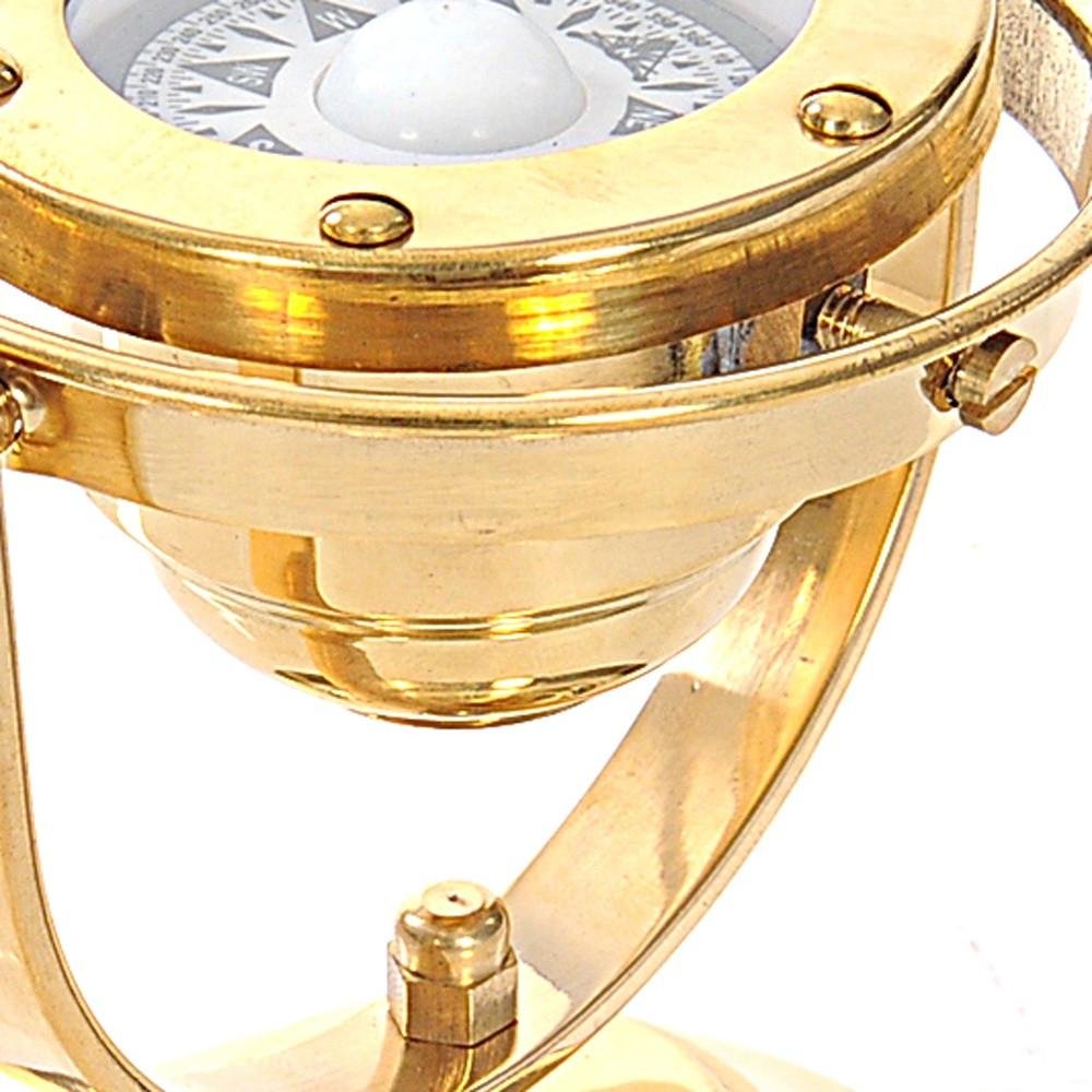 4.5" X 5" X 5.5" Gimbaled Compass. Sculpture in gold metal.