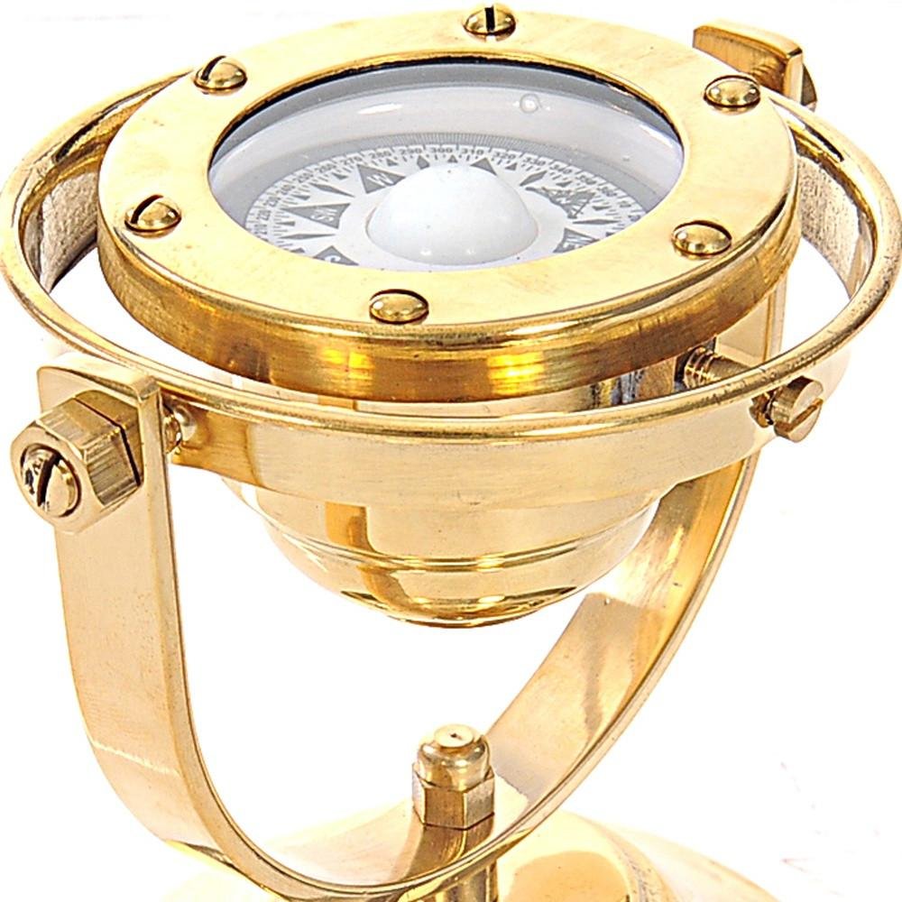 4.5" X 5" X 5.5" Gimbaled Compass. Sculpture isolated on a plain white background, in a gold metal finish.