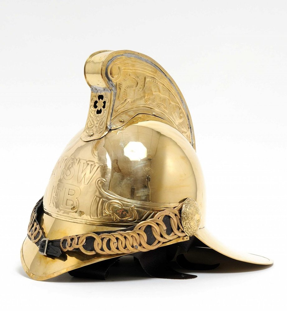 10" X 12" X 11" Fireman Helmet. Home product isolated on a plain white background, in a tan finish.