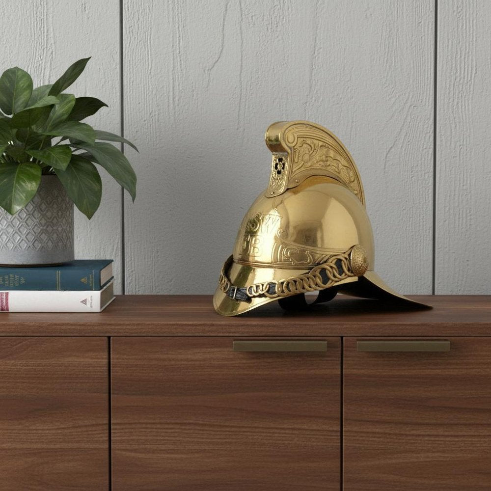 10" X 12" X 11" Fireman Helmet styled in a furnished interior with a light gray wall on a dark wood floor in dark brown.