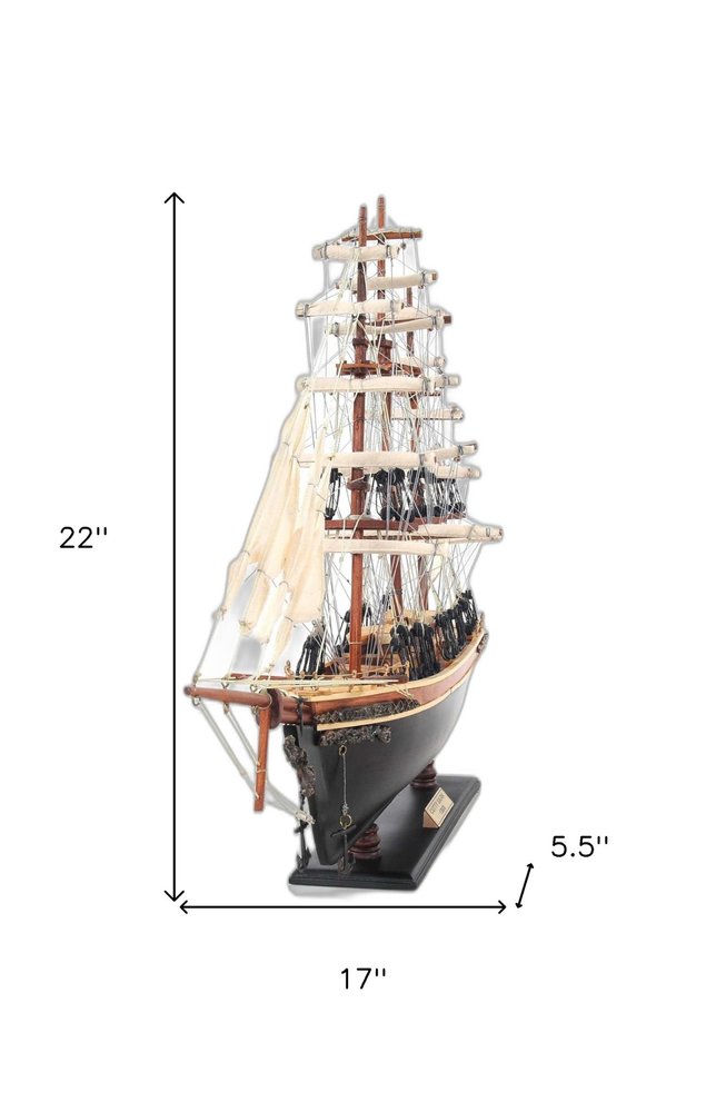 17" Brown Wood and Metal Hand Painted Cutty Sark Model Boat Tabletop Sculpture. Sculpture isolated on a plain white background, showing a metal surface.