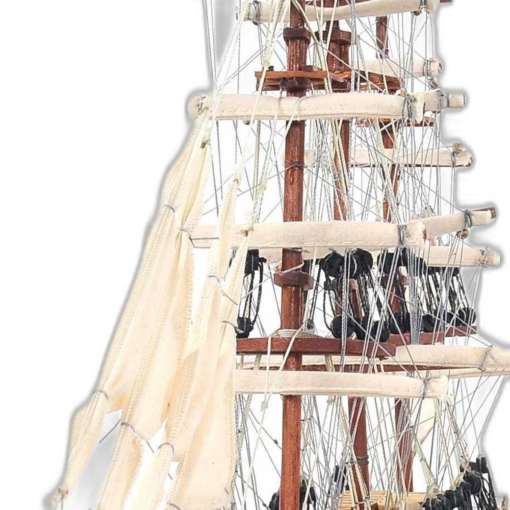 17" Brown Wood and Metal Hand Painted Cutty Sark Model Boat Tabletop Sculpture. Sculpture isolated on a plain white background, showing a metal surface.