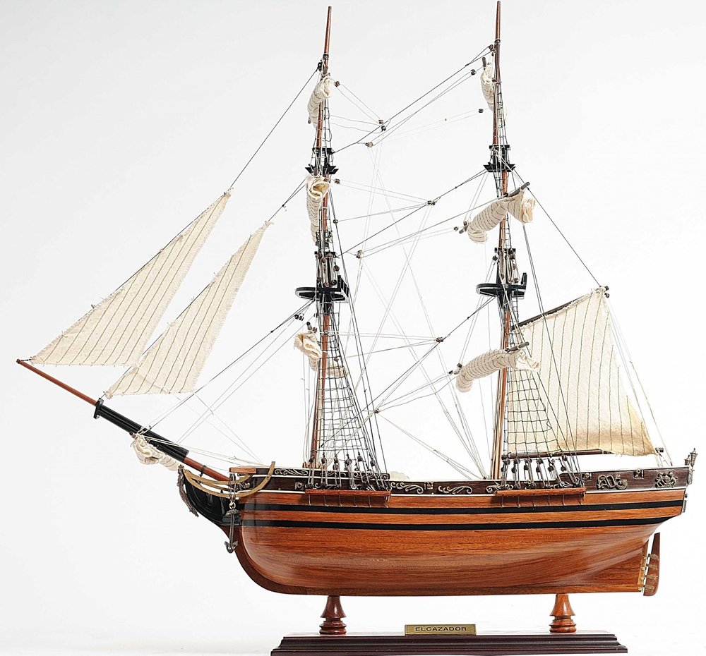 24" Brown Solid Wood Hand Painted Boat Model Boat. Home product isolated on a plain white background, showing a brown wood surface.