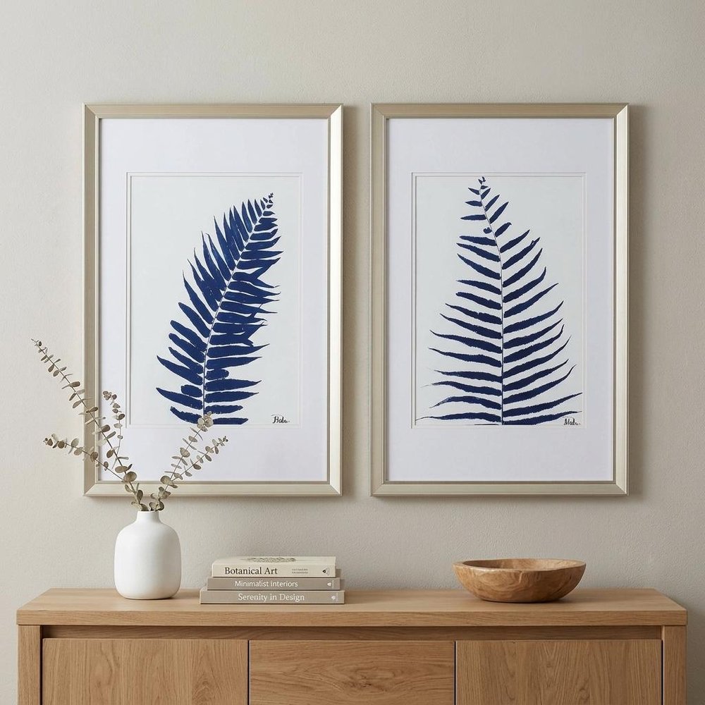 Set of Two Indigo Leaves Champagne Gold Framed Art in a home interior
