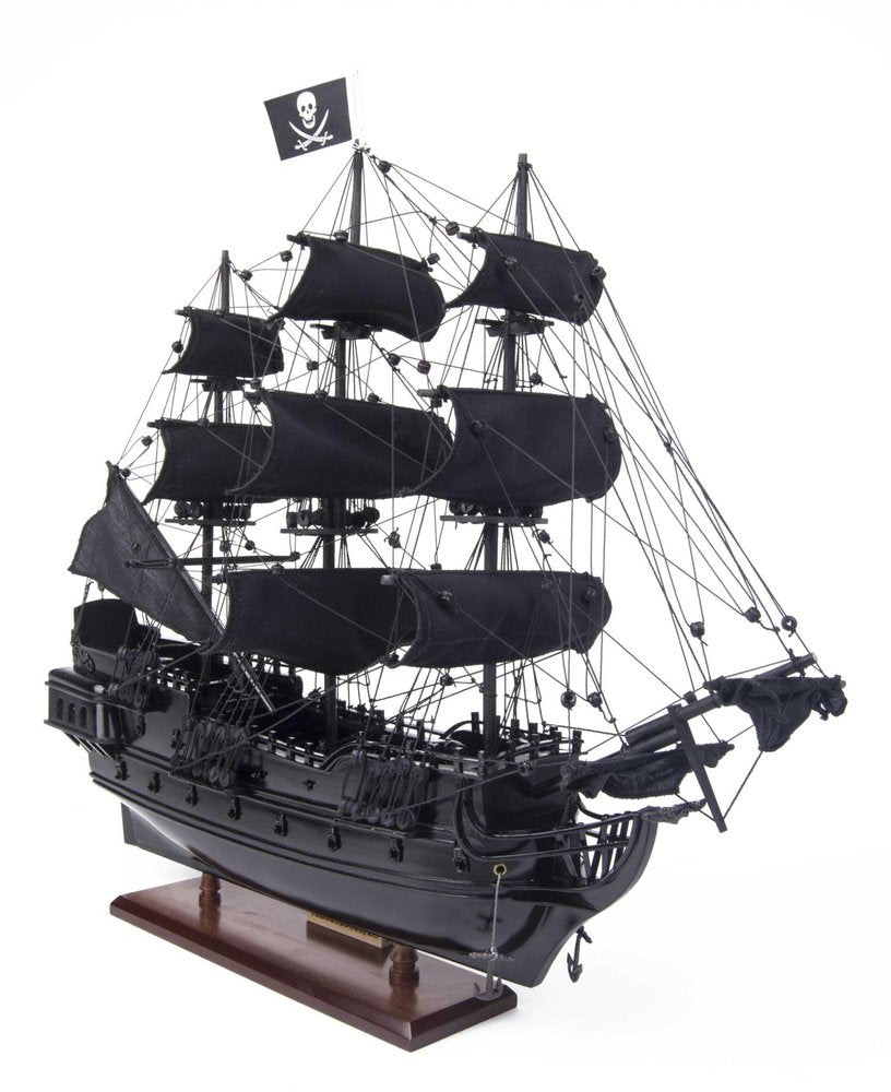 19" Black Solid Wood Hand Painted Model Boat. Home product isolated on a plain white background, finished in black wood.