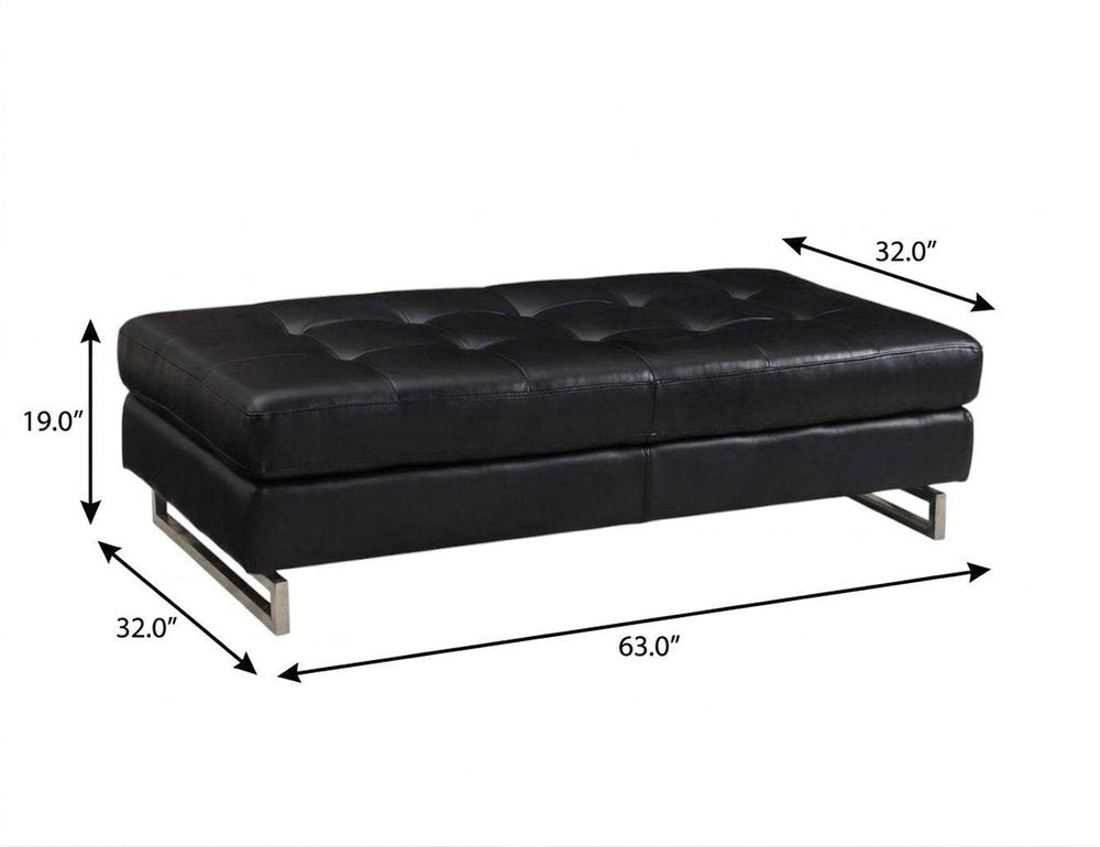 63" Black Tufted Faux Leather and Silver Ottoman. Ottoman isolated on a plain white background, showing a silver faux leather surface.