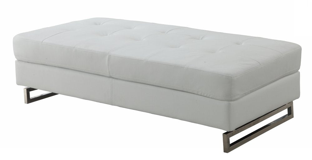 White faux leather tufted ottoman with silver metal legs on a white background.