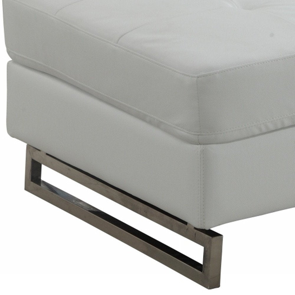 63" White and Silver Faux Leather Ottoman. Ottoman in silver faux leather.