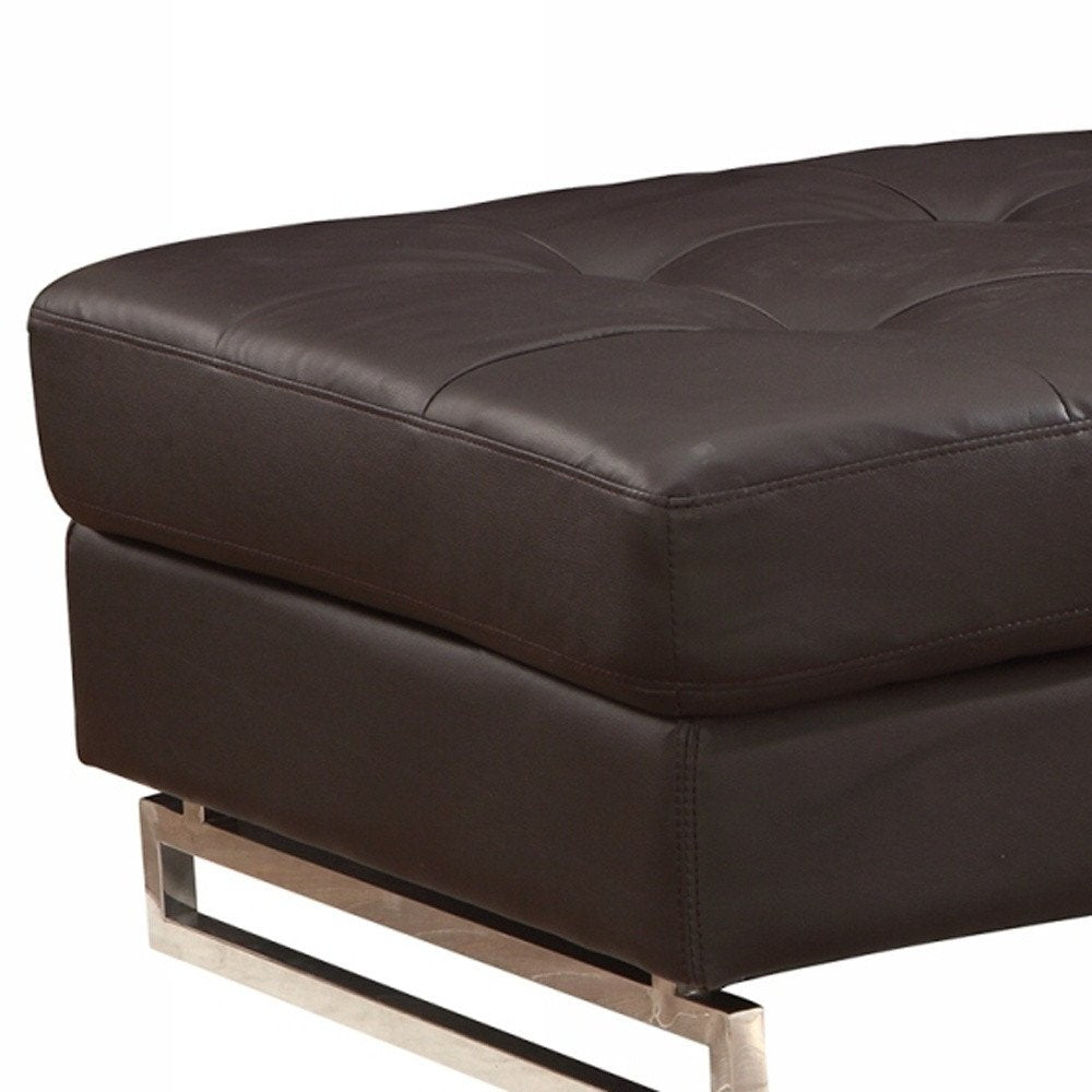 63" Brown and Silver Faux Leather Tufted Ottoman. Ottoman isolated on a plain white background, finished in brown faux leather.