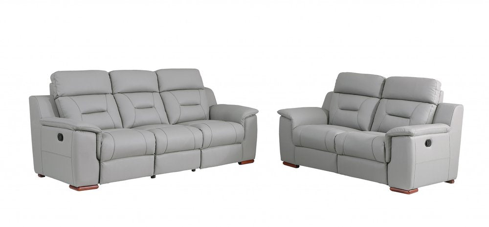 Two-piece gray genuine leather five-person seating set with reclining features on a white background.