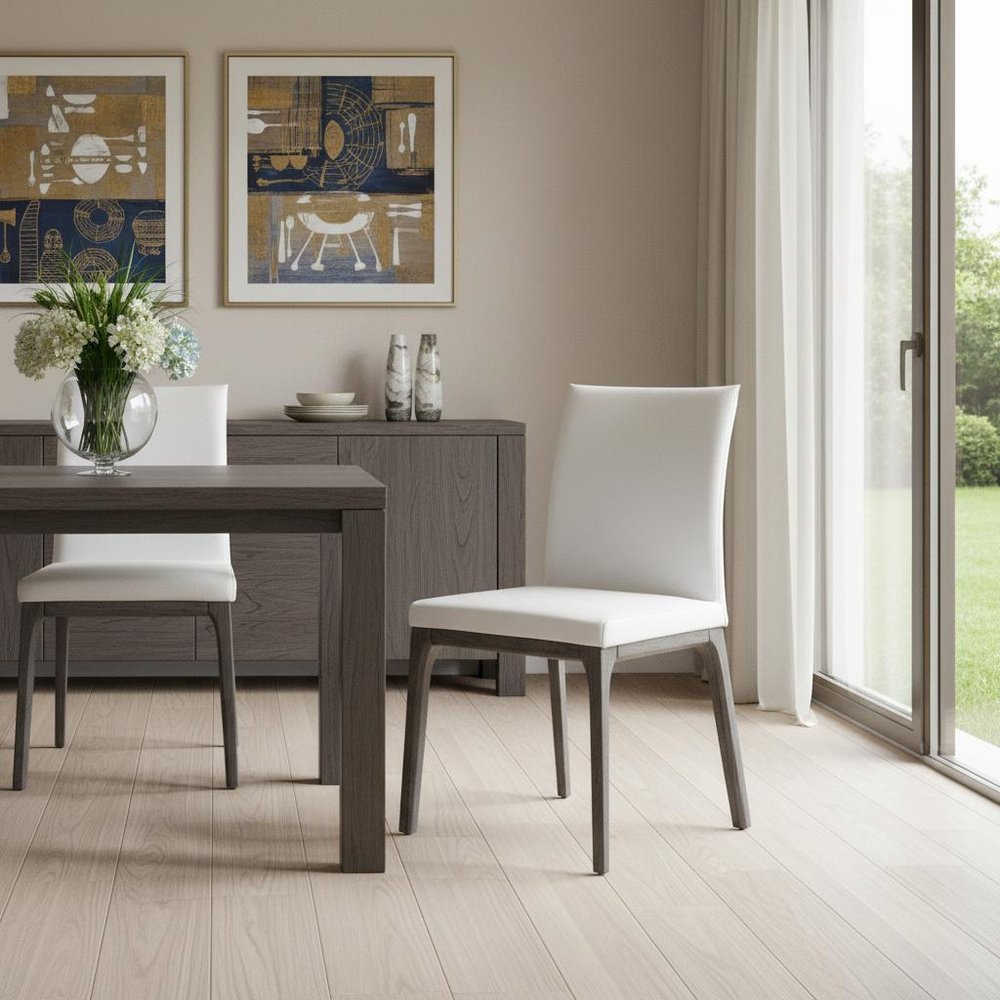 Set of Two White and Gray Upholstered Faux Leather Dining Side Chairs in a home interior