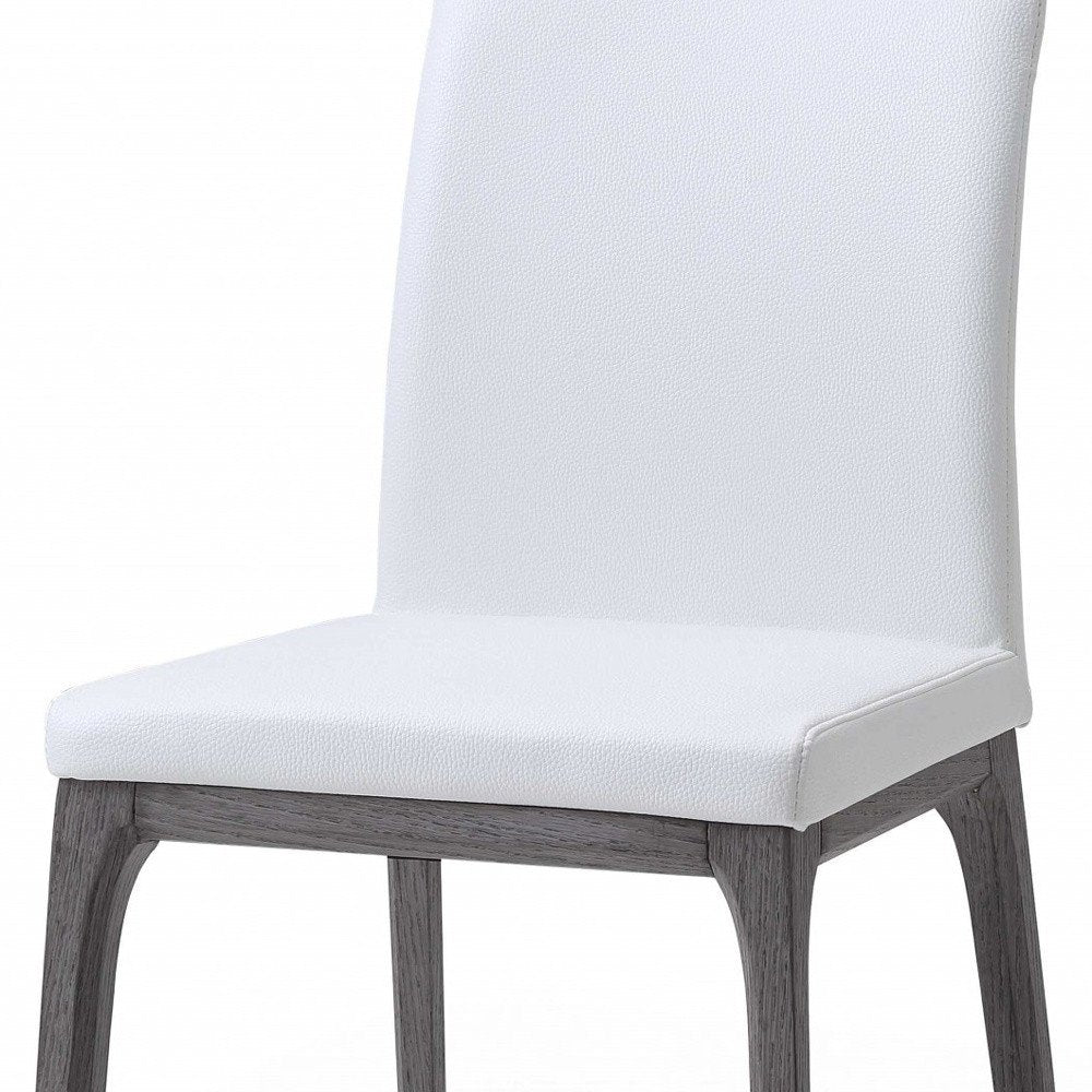 Set of Two White and Gray Upholstered Faux Leather Dining Side Chairs on a white background
