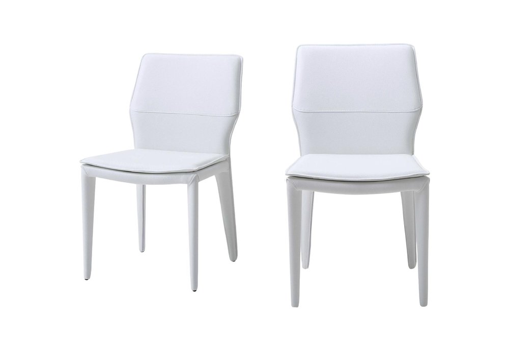 Set of Two White Slipcovered Upholstered Faux Leather Dining Side Chairs on a white background