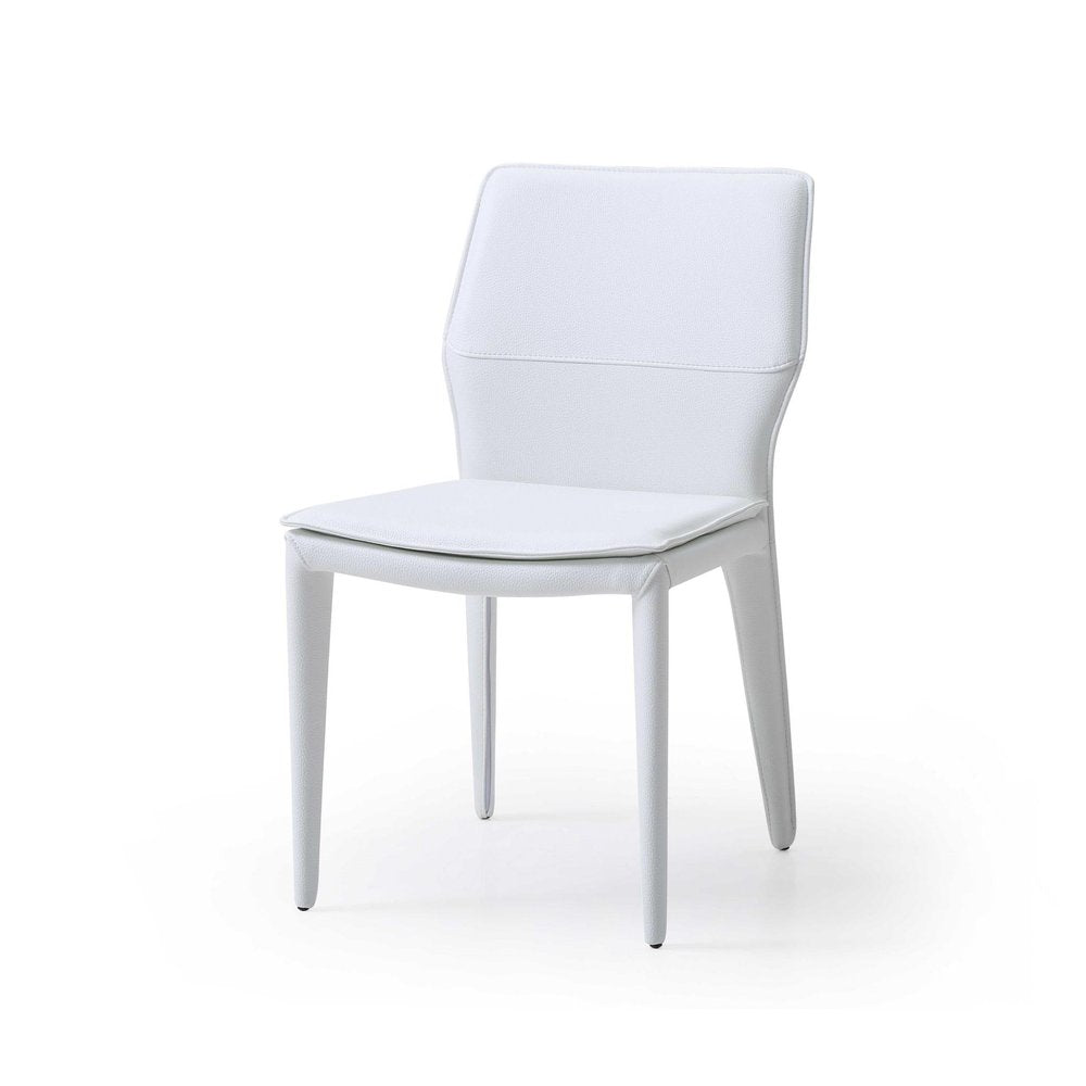 White faux leather upholstered dining chair with four legs on a white background.