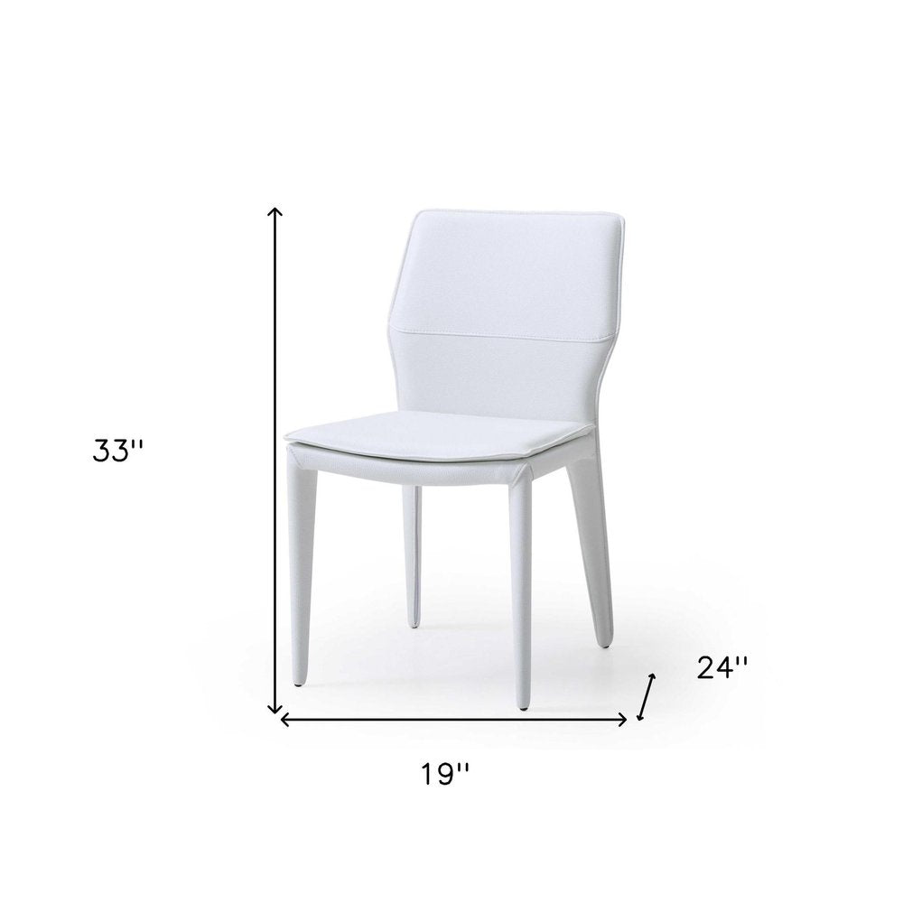 Set of Two White Slipcovered Upholstered Faux Leather Dining Side Chairs on a white background