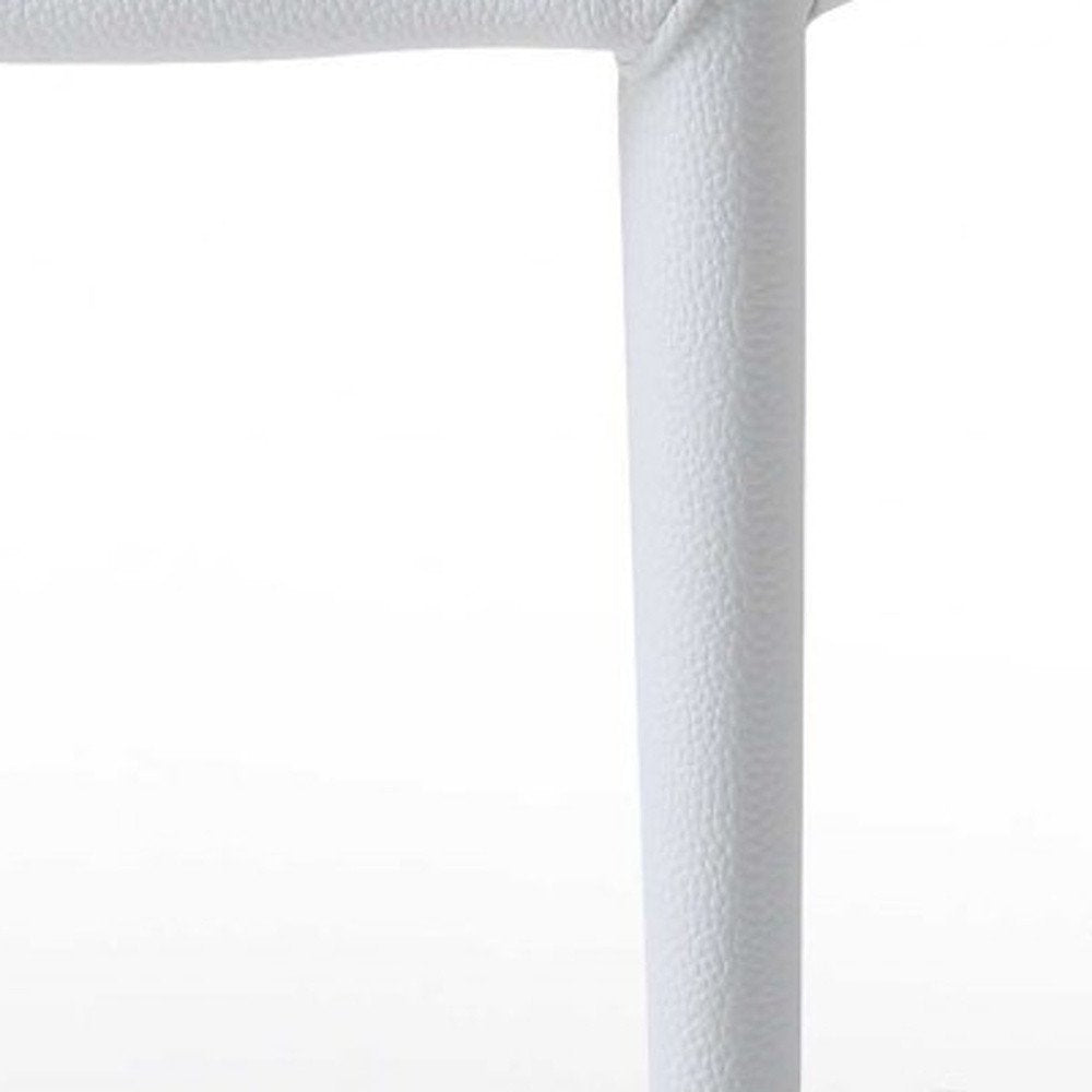 Set of Two White Slipcovered Upholstered Faux Leather Dining Side Chairs on a white background