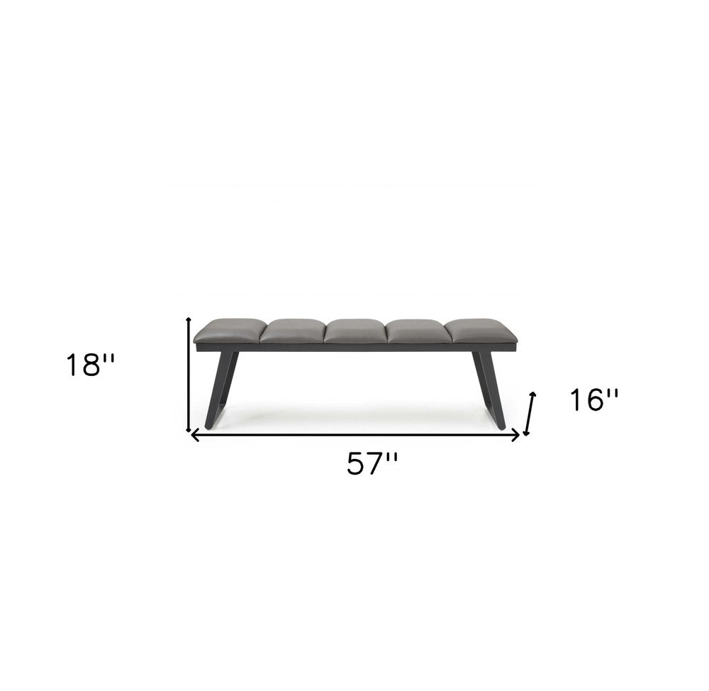57" Gray Upholstered Faux Leather Bench. Bench isolated on a plain white background, finished in gray faux leather.