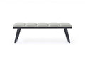 57" Light Gray and Black Upholstered Faux Leather Bench. Bench isolated on a plain white background, finished in light gray faux leather.