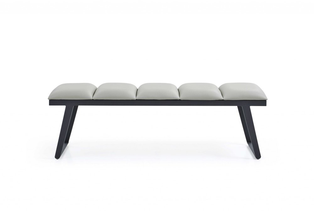 57" Light Gray and Black Upholstered Faux Leather Bench. Bench isolated on a plain white background, finished in light gray faux leather.