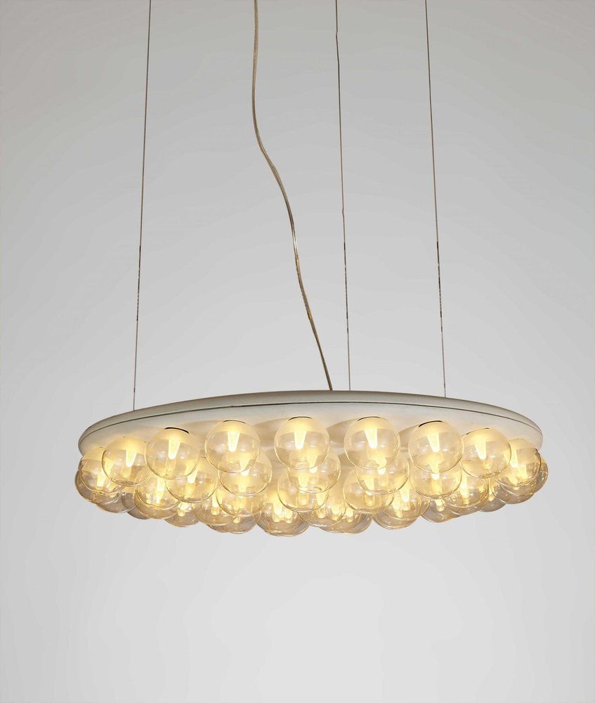 29 X 29 X 7 White Glass Metal Pendant Lamp. Pendant light isolated on a plain white background, showing a white glass surface.