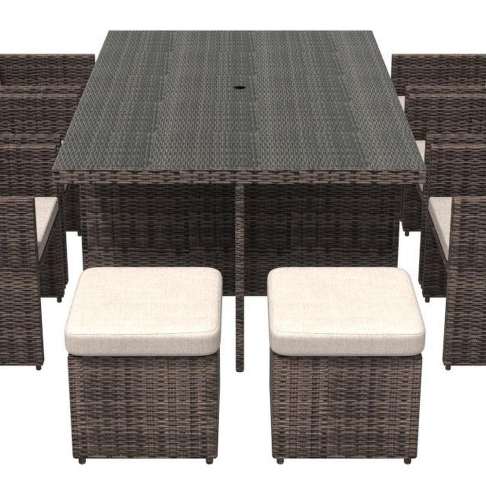 11 Piece Clear and Gray Glass Dining Set. Outdoor dining set isolated on a plain white background, finished in gray glass.