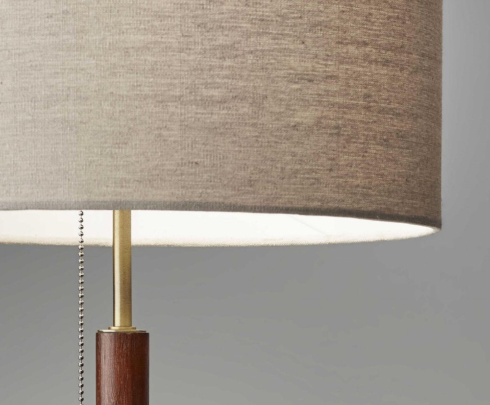 26" Antiqued Brass Solid Wood Table Lamp With Beige Drum Shade close-up highlighting the beige wood surface.