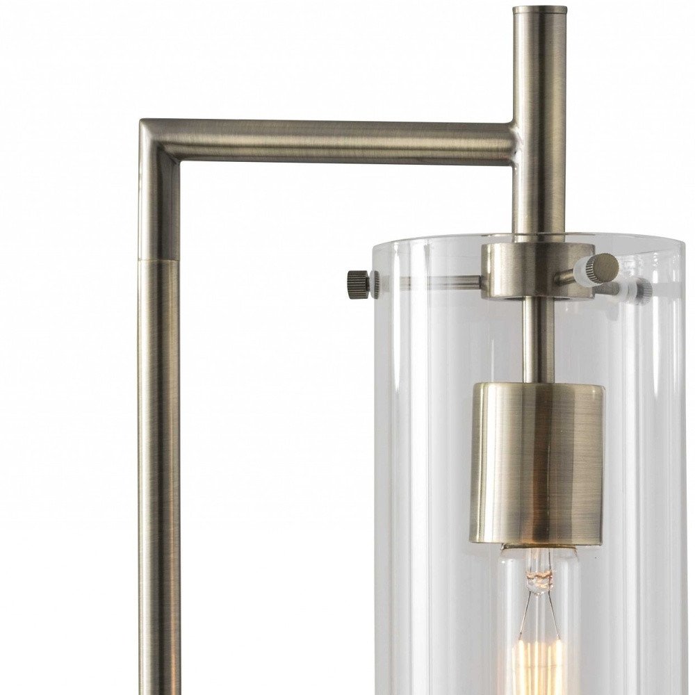 24" Brass Novelty With Clear Cylinder Shade. Home product isolated on a plain white background, in a clear finish.
