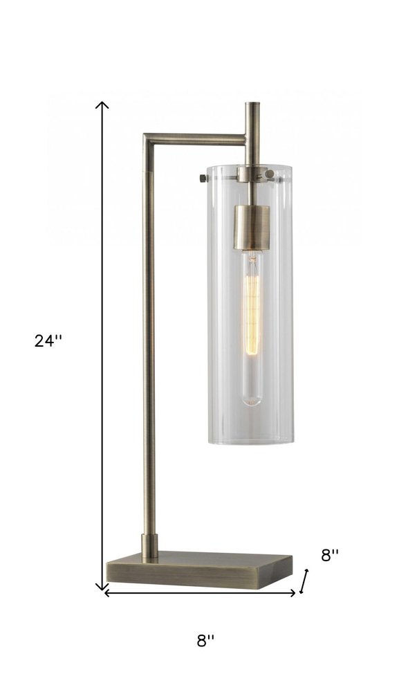 24" Brass Novelty With Clear Cylinder Shade. Home product isolated on a plain white background, in a clear finish.