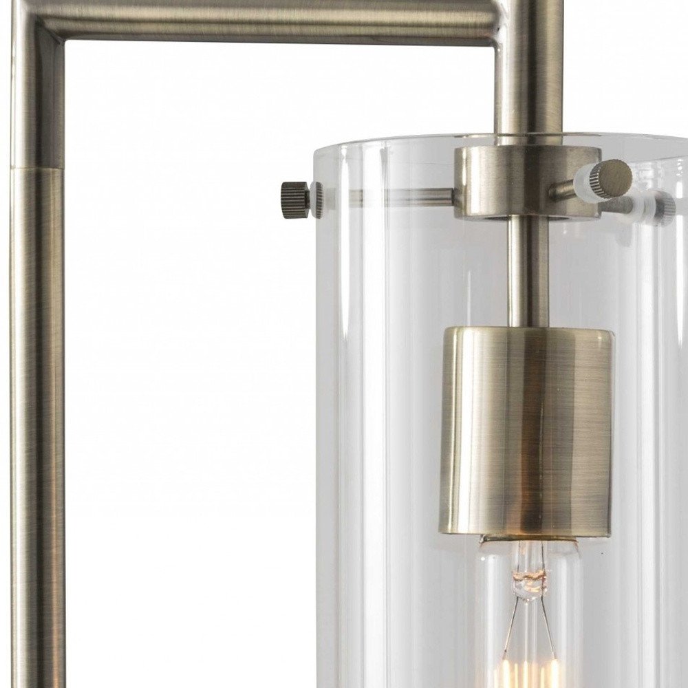 24" Brass Novelty With Clear Cylinder Shade. Home product in clear.