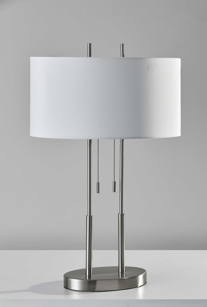 27" Silver Metal Two Light Bedside Lamp With Off White Drum Shade. Lamp isolated on a plain white background, finished in off-white metal.