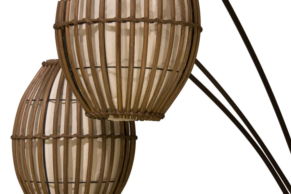 82" Bronze Three Light Tree Floor Lamp With Beige Wicker Cage Shade on a white background