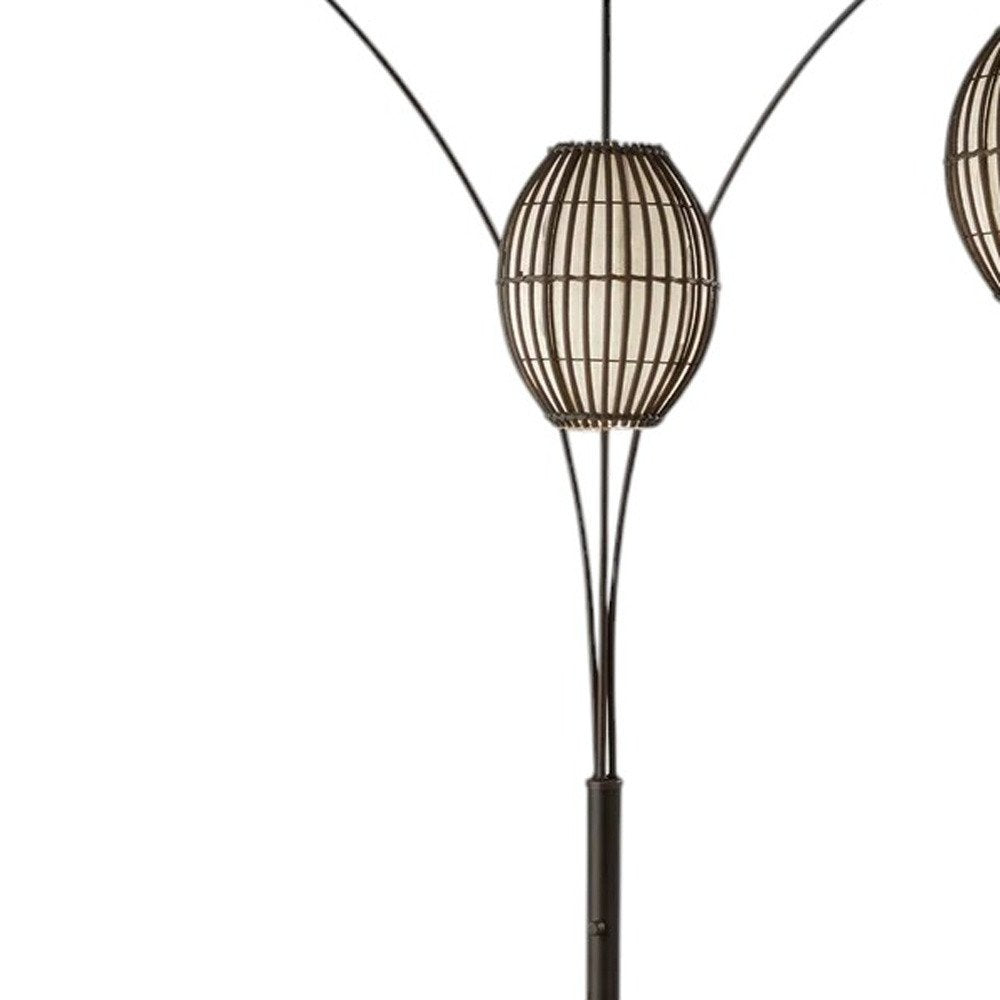 82" Bronze Three Light Tree Floor Lamp With Beige Wicker Cage Shade on a white background
