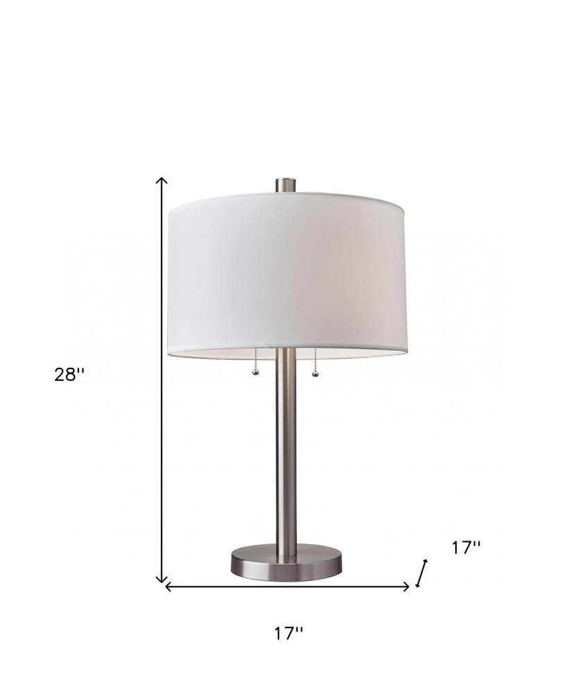 28" Silver Metal Two Light Bedside Table Lamp With White Drum Shade. Table lamp isolated on a plain white background, in a silver metal finish.
