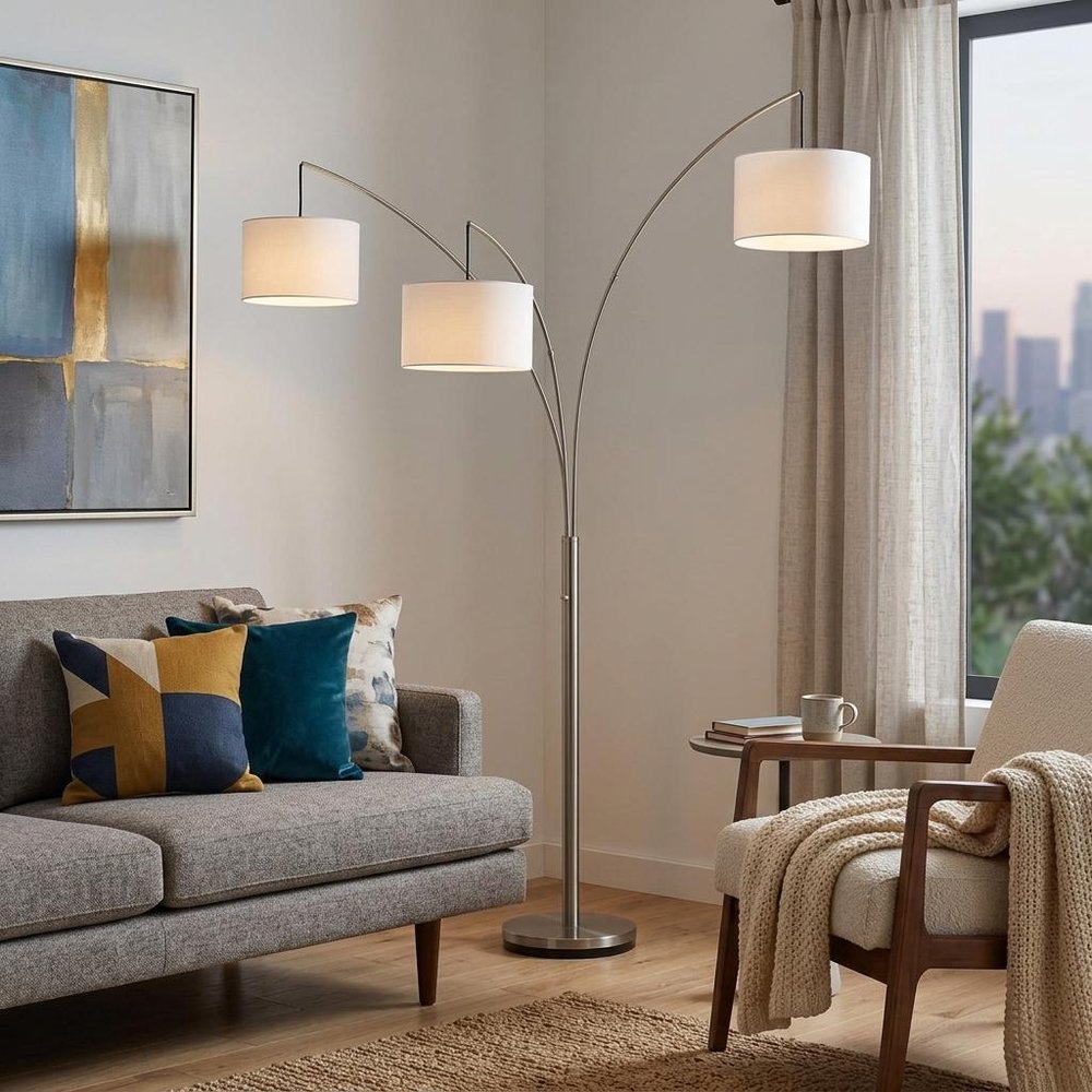 74" Silver Three Light Tree Floor Lamp With White Linen Drum Shade in a home interior