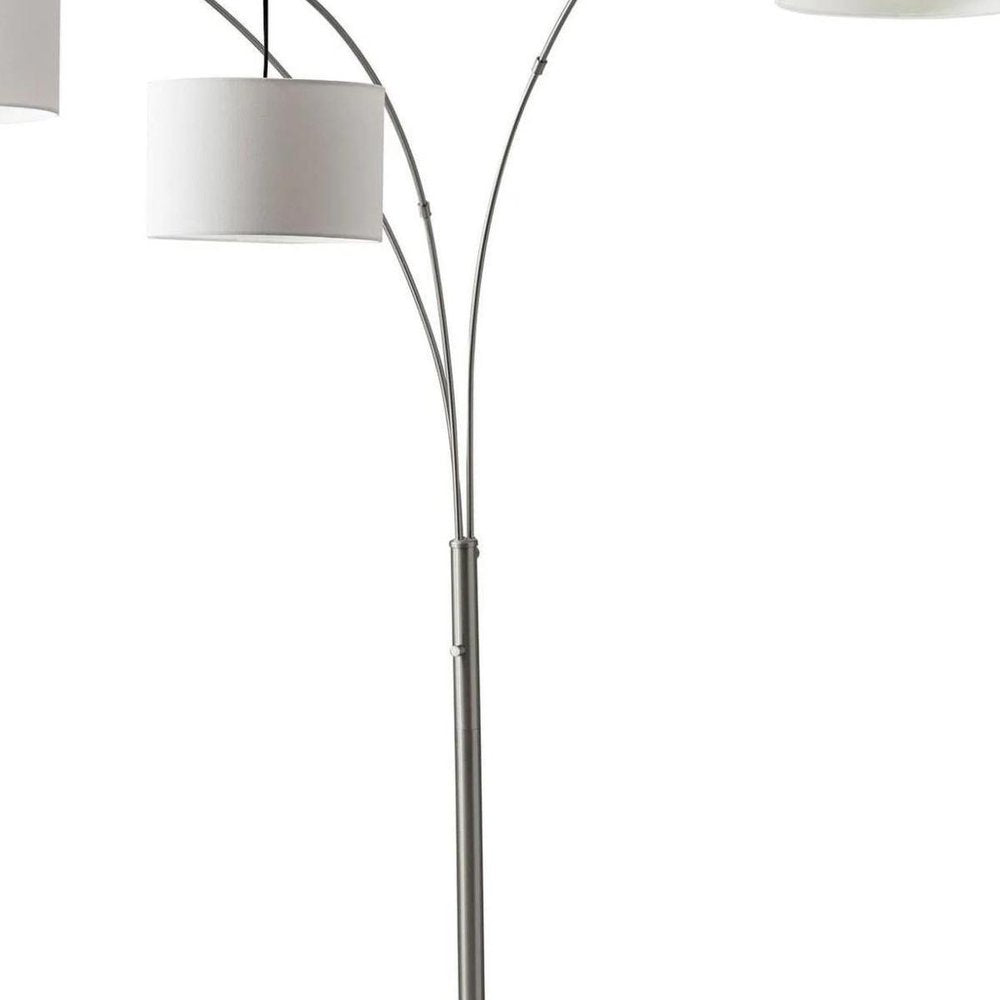74" Silver Three Light Tree Floor Lamp With White Linen Drum Shade on a white background