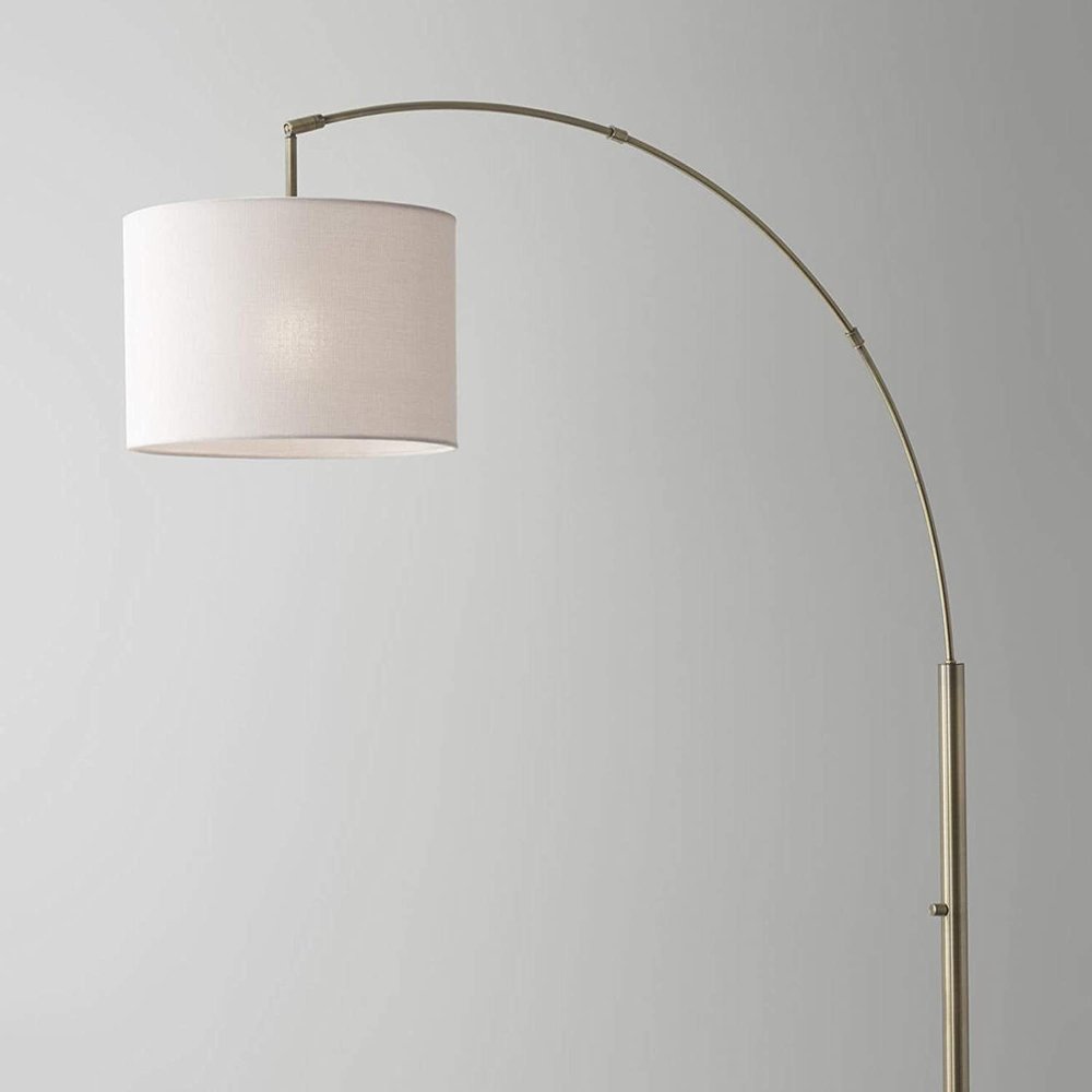 74" Brass Metal Arc Floor Lamp With Off White Linen Drum Shade close-up detail