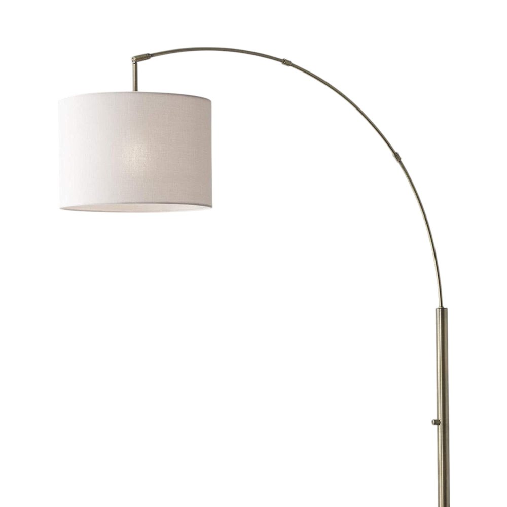 74" Brass Metal Arc Floor Lamp With Off White Linen Drum Shade on a white background