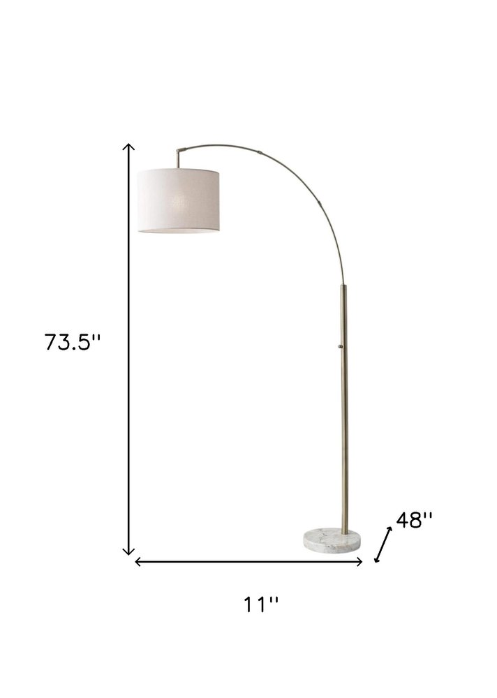 74" Brass Metal Arc Floor Lamp With Off White Linen Drum Shade on a white background