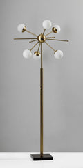 64" Brass Six Light LED Novelty Floor Lamp With White Glass Globe Shades close-up highlighting the glass surface.